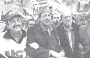 De izquierda a derecha: Gimenez (MST), Buzzi (FA) y Biolcati (Sociedad Rural)