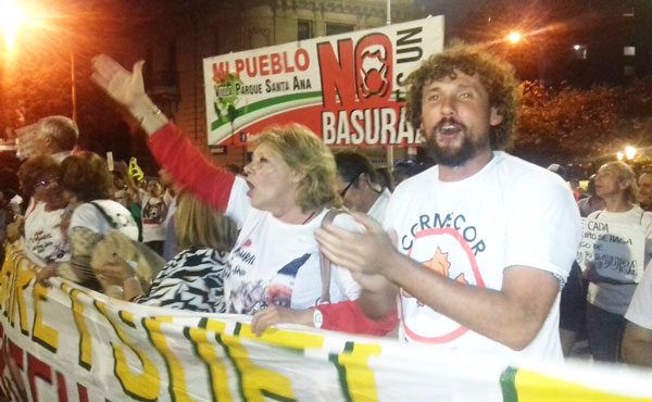Olverio y Peressini en la movilizacion