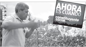 De Gennaro hablando en Jujuy. Ilustra la imagen un afiche promoviendo la Constituyente Social con la consigna Ahora es cuando