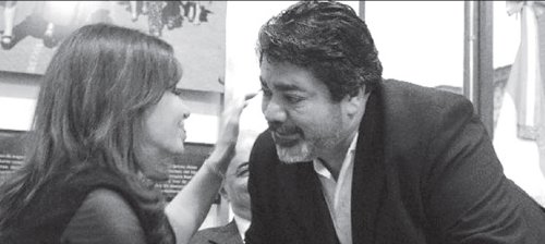 Cristina besando al burcrata de la UOCRA